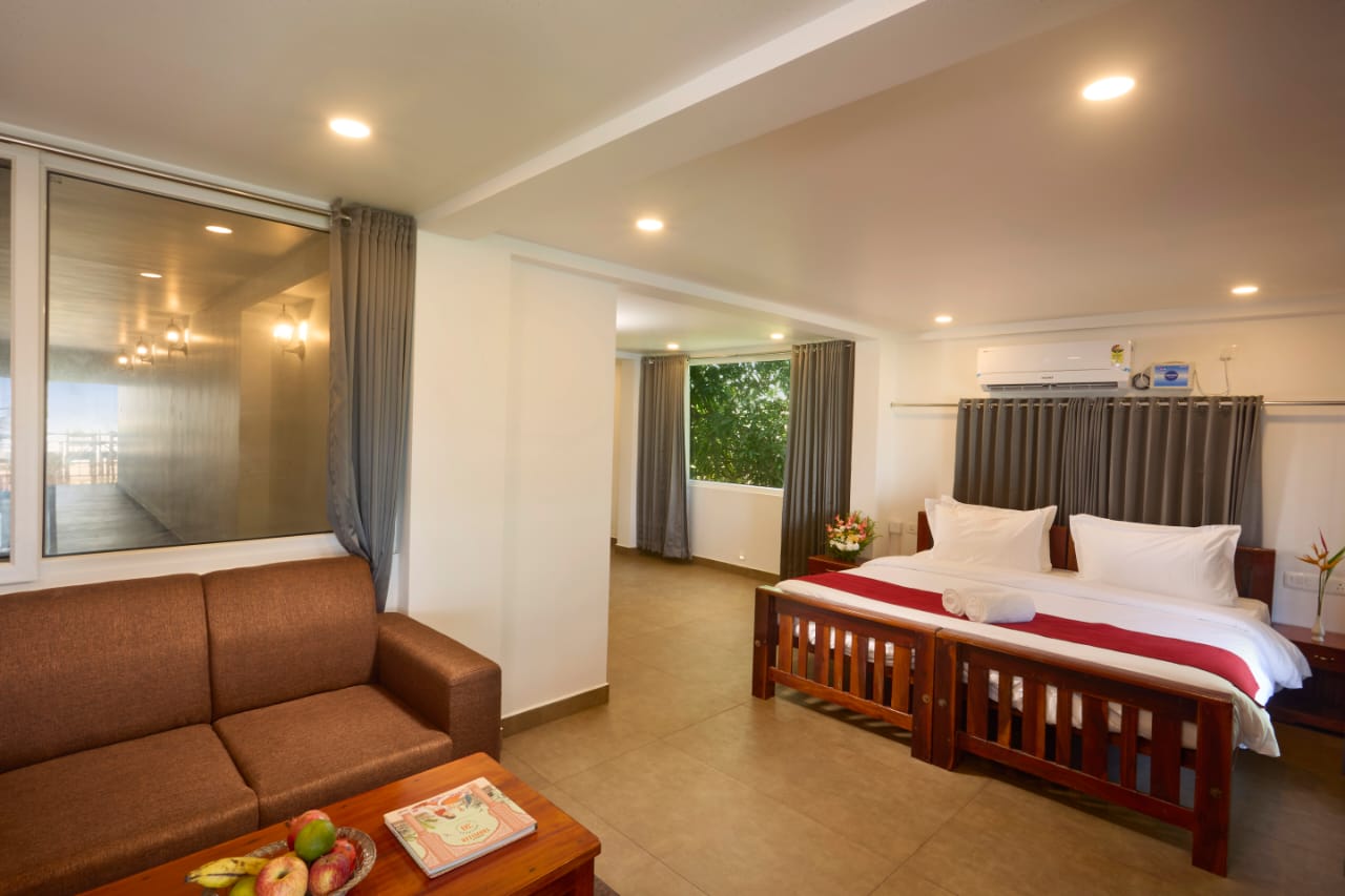 Well-furnished bedroom at Akanta Ayurveda & Yoga Cherai designed for a calm and peaceful stay during the yoga retreat in Kerala.