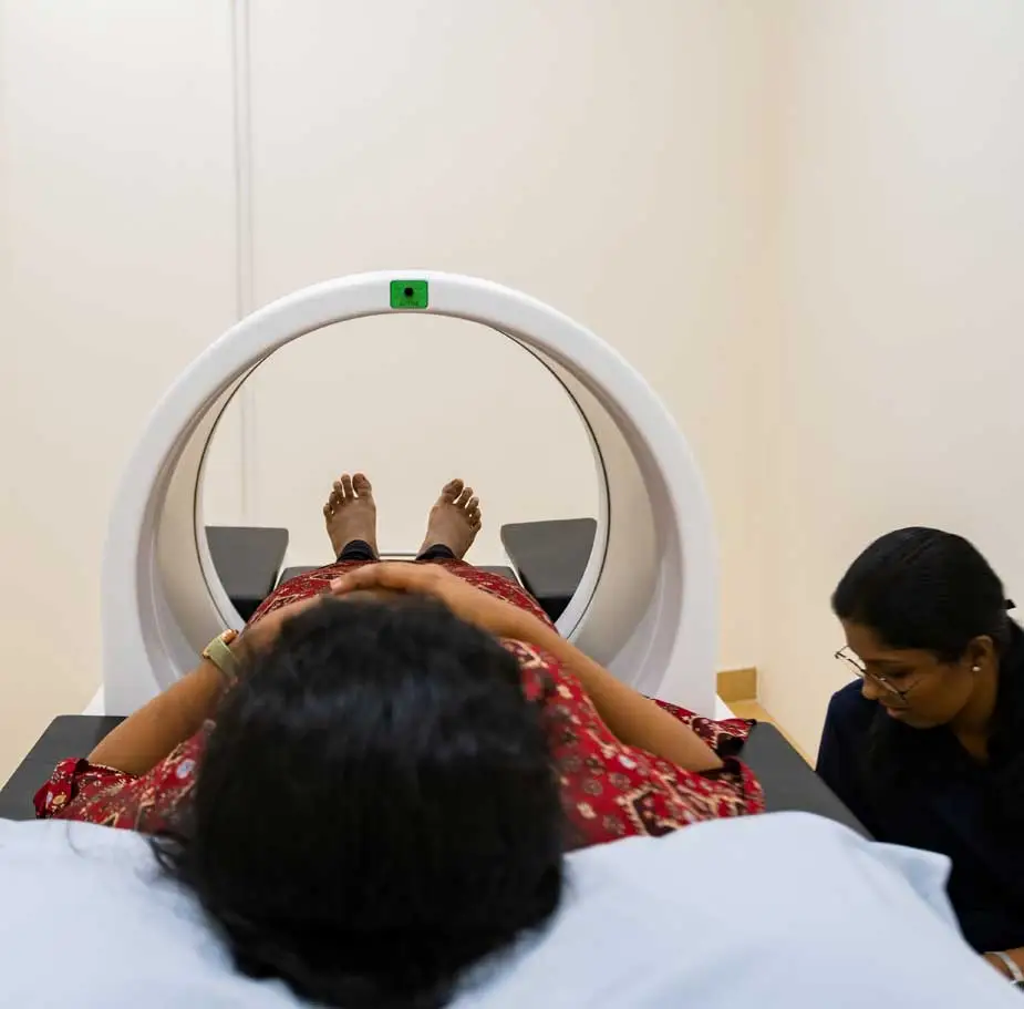 Patient receiving knee pain treatment therapy to reduce joint pain and improve mobility