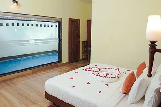 Private pool villa in Wayanad at Indeevara Retreat surrounded by lush greenery and misty hills
