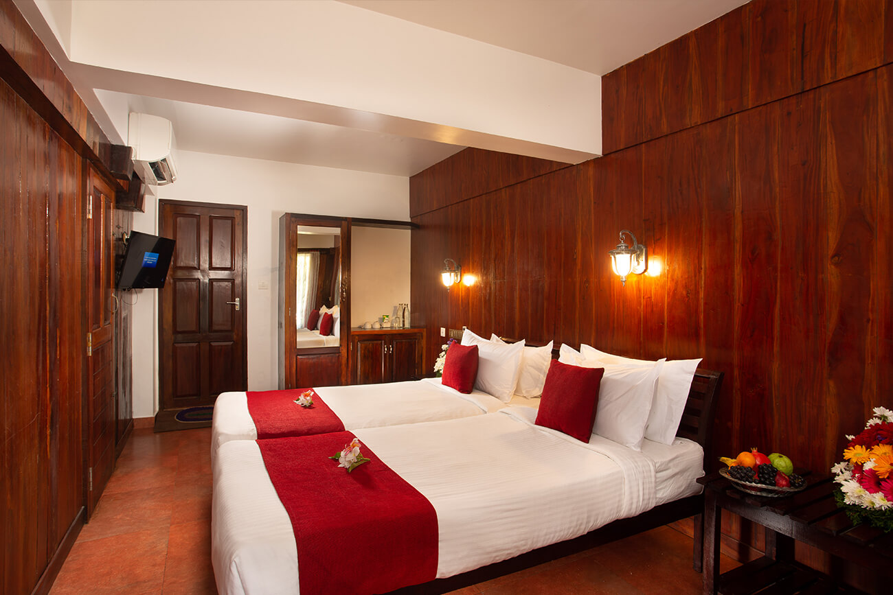 Comfortable and well-designed accommodation at Akanta Ayurvedic Resort in Kerala surrounded by peaceful natural surroundings